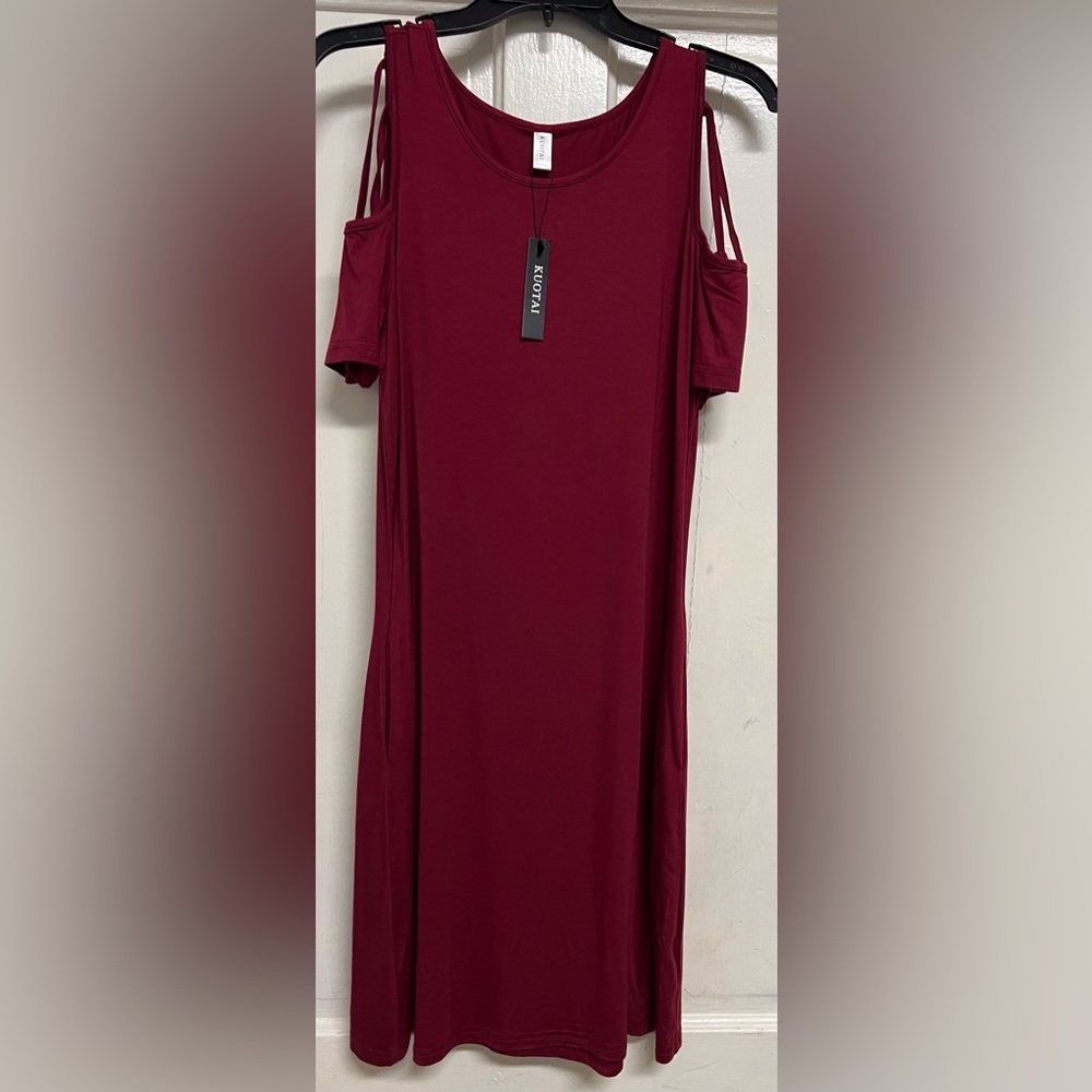 New with tag; Never worn; Size Medium